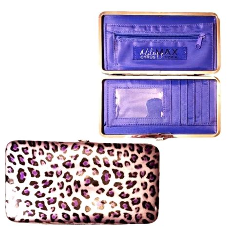 Miley Cyrus Max Azria Floral Wallet with Purple Inside 7” X 3.5”.